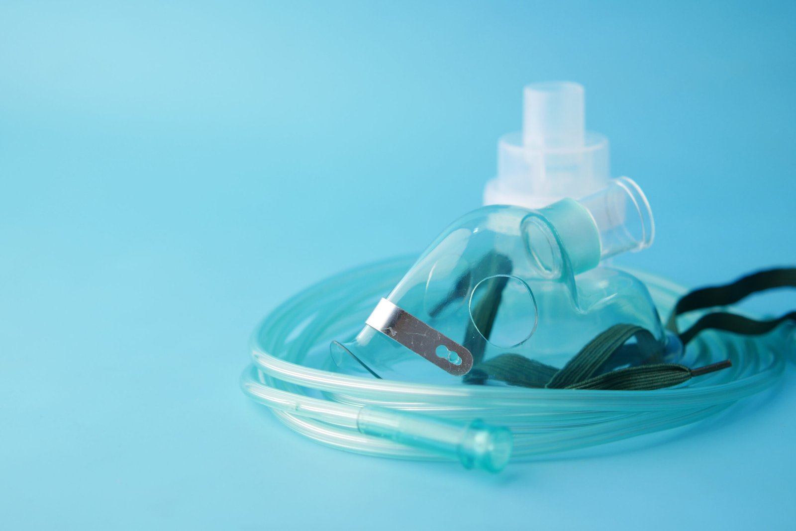 child nebulizer on blue background top view 2023 11 27 05 33 35 utc scaled