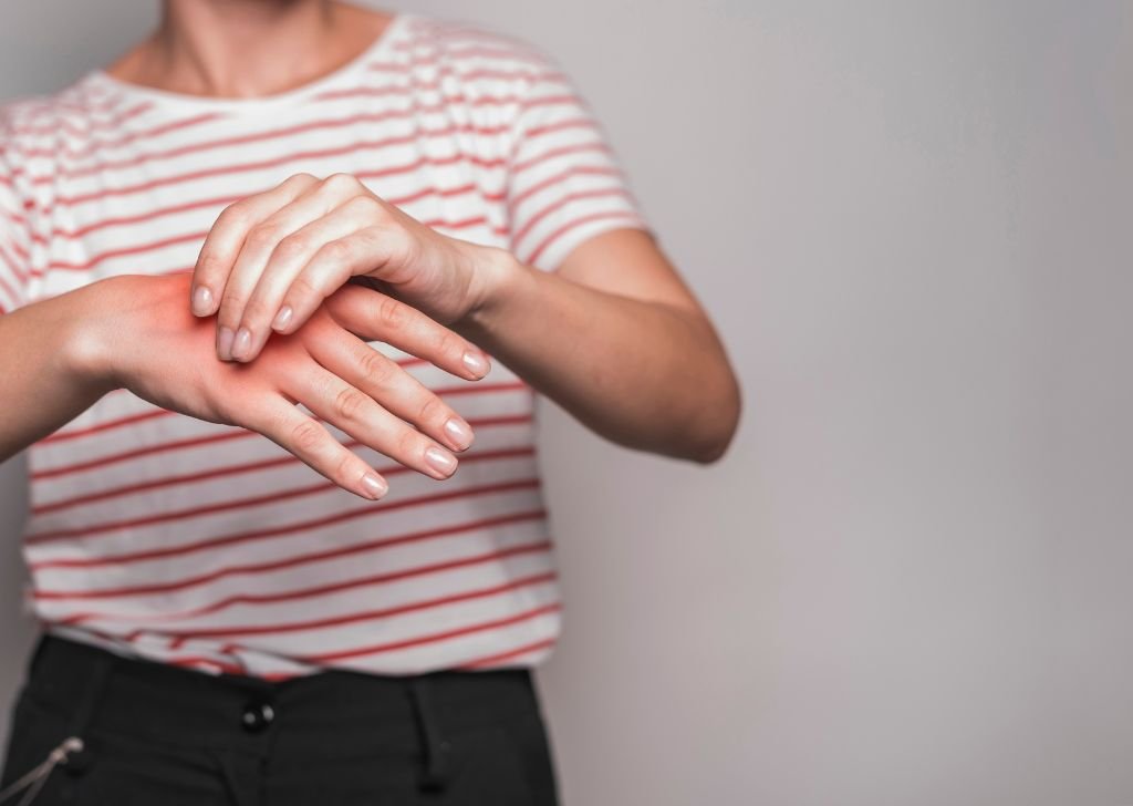 A patient experiencing pain from Carpal Tunnel Syndrome. An intra articular injection can offer pain relief.