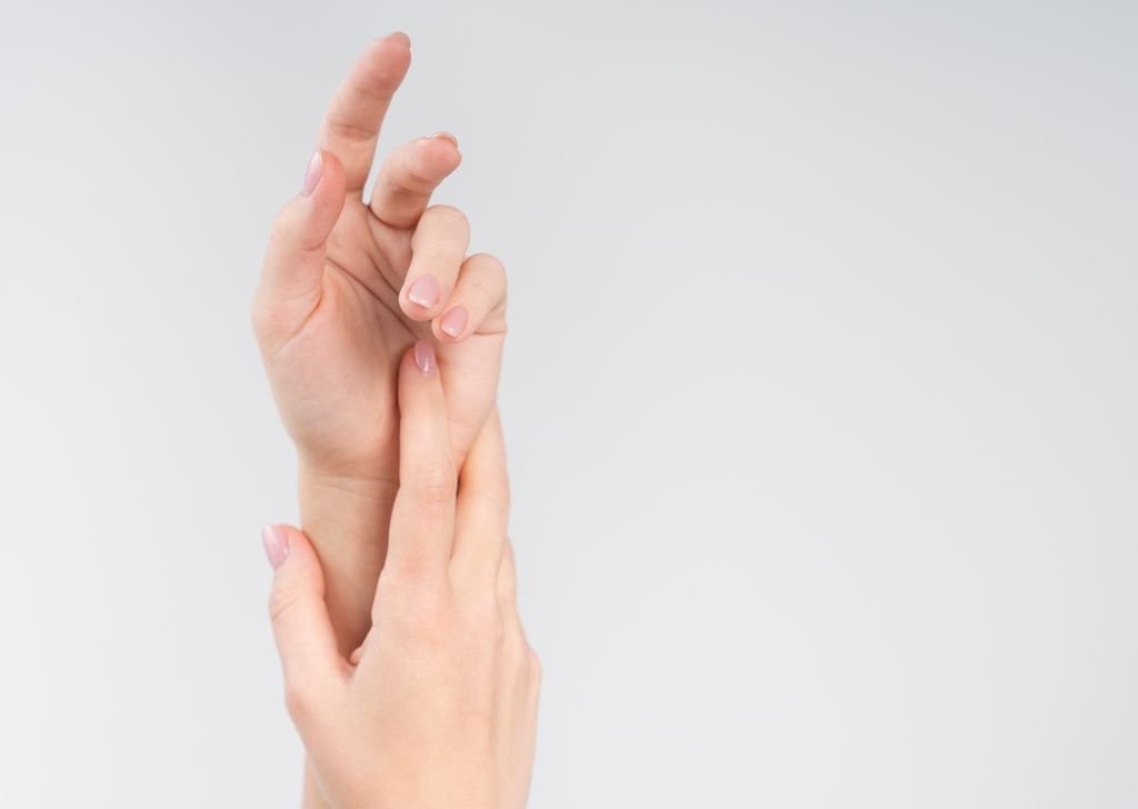 Trigger finger symptom emerging from a patient's hand. This can be treated via an intra articular injection shot.